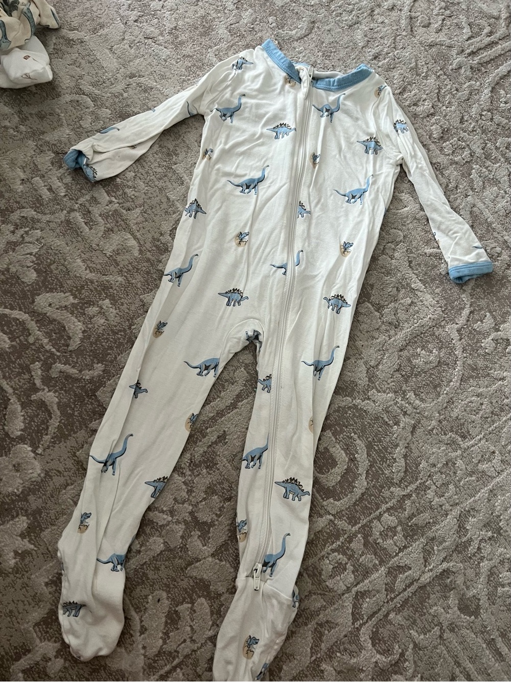 Kyte BABY White Footed One-Piece with Blue Dinosaur Print